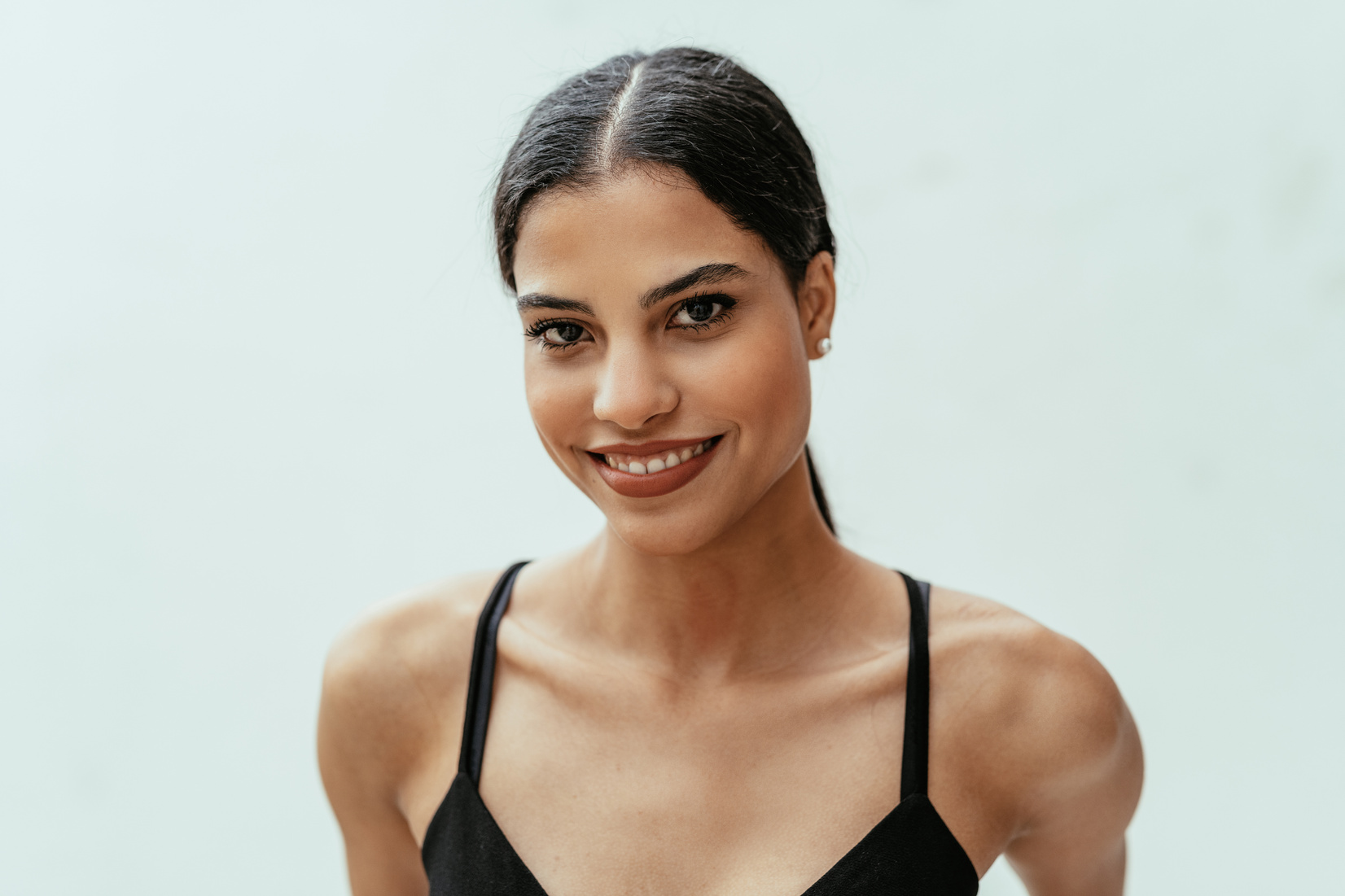 Portrait of beautiful Latina young woman smiling